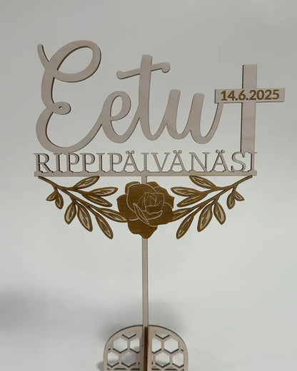 Rippipäivänäsi kakunkoriste ristillä